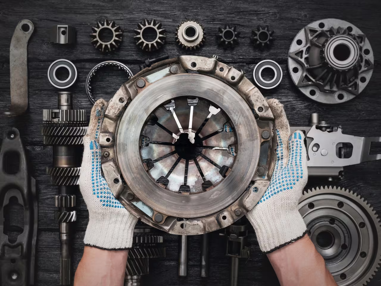 Worn clutch plate and pressure plate removed from a vehicle at Central East Mechanical in Dapto